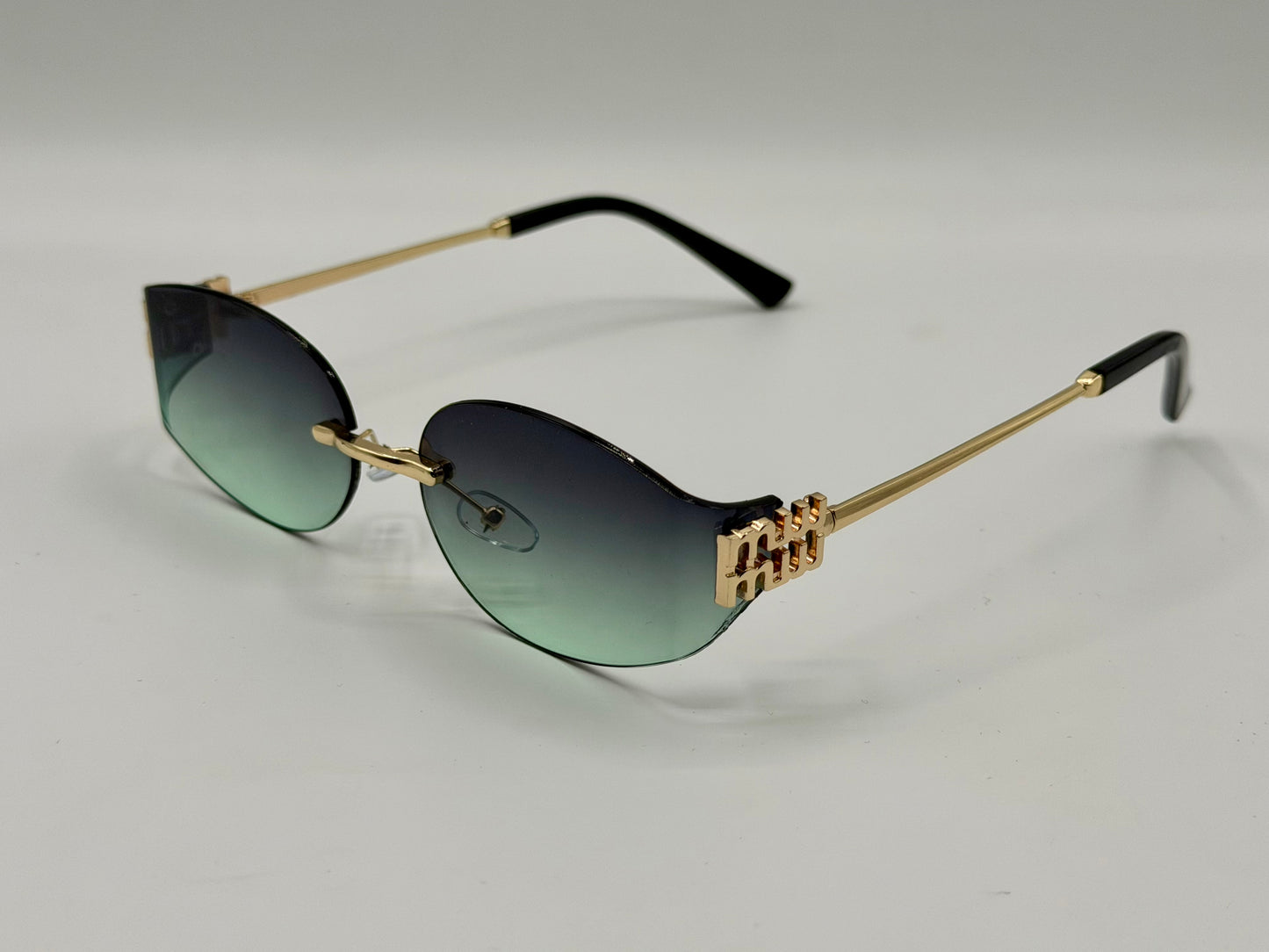 Miu Miu Oval Rimles Sunglasses 🕶️ A035