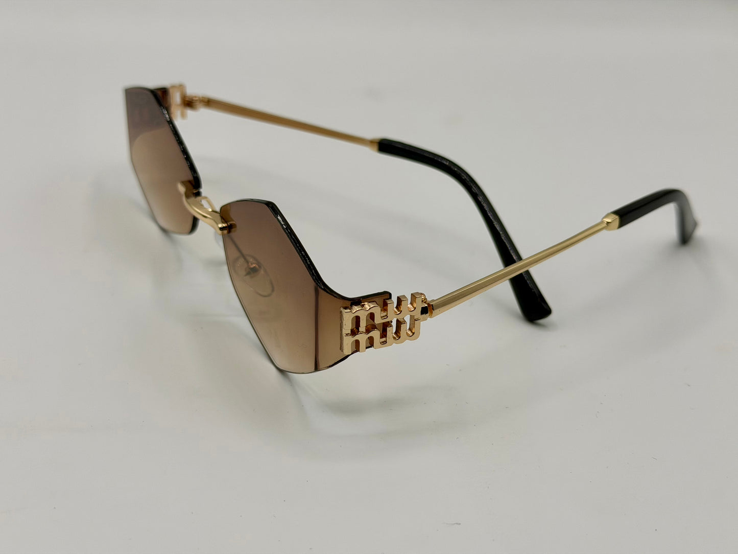 Miu Miu Oval Rimles Sunglasses 🕶️ A035