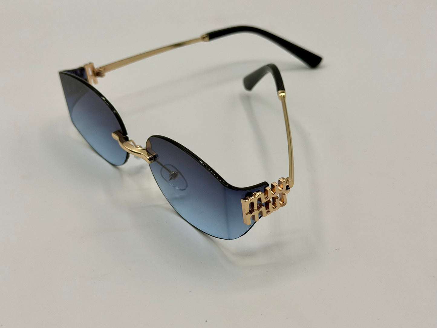 Miu Miu Oval Rimles Sunglasses 🕶️ A035